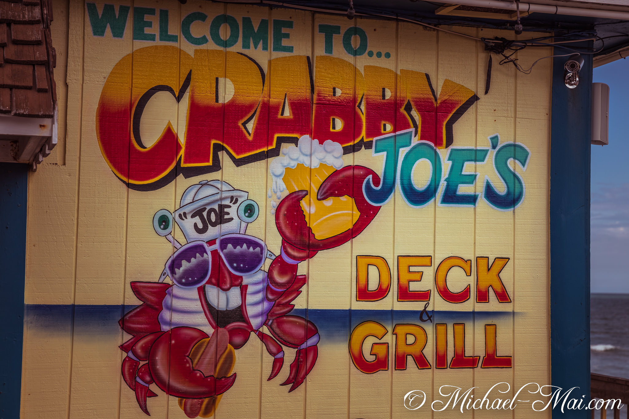 Signature crab mascot greets visitors to Crabby Joe's Deck & Grill. | Daytona Beach Shores, Florida, United States