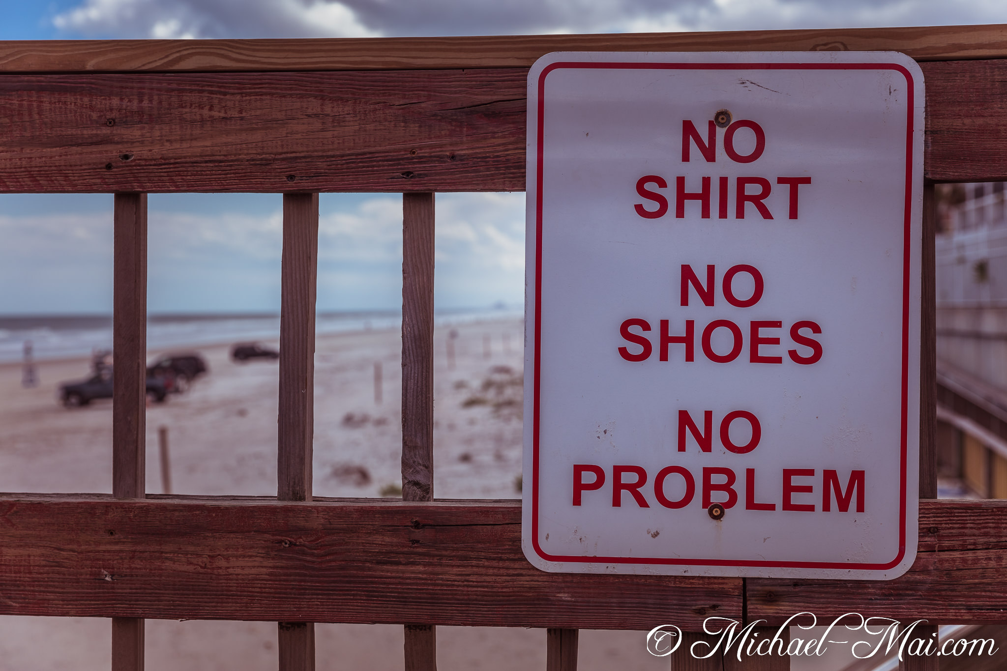 Declaring no problems, a classic beach sign welcomes simplicity and carefree days. | Daytona Beach Shores, Florida, United States