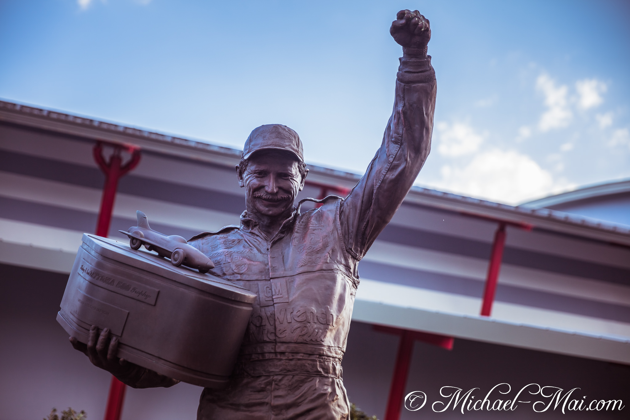 A bronze statue captures racing legend Dale Earnhardt's joyful victory celebration | Daytona Beach, Florida, United States