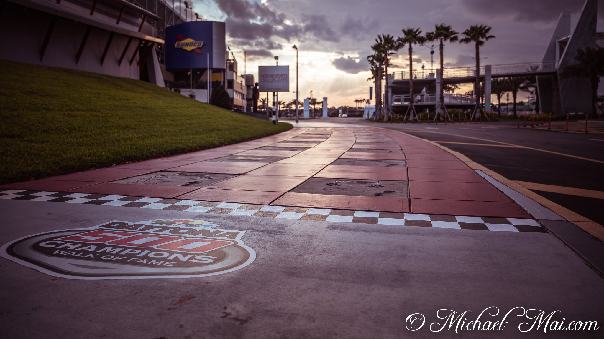 Walk of Fame footprints pave the path to legendary Daytona victories under a cloudy sky. | Daytona Beach, Florida, United States