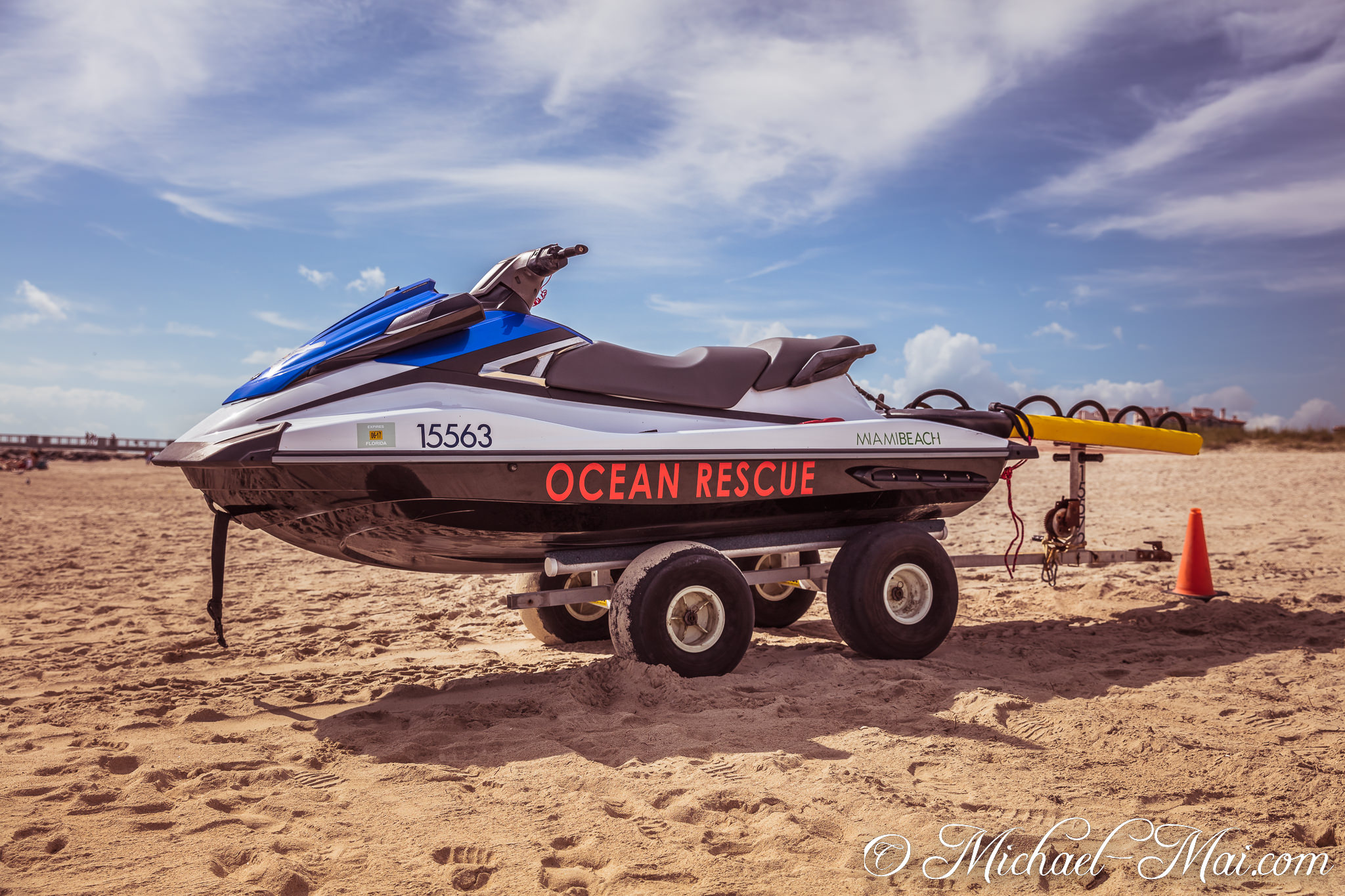 Ocean Rescue jet ski poised for action on its trailer on the warm sand. | Miami Beach, Florida, United States