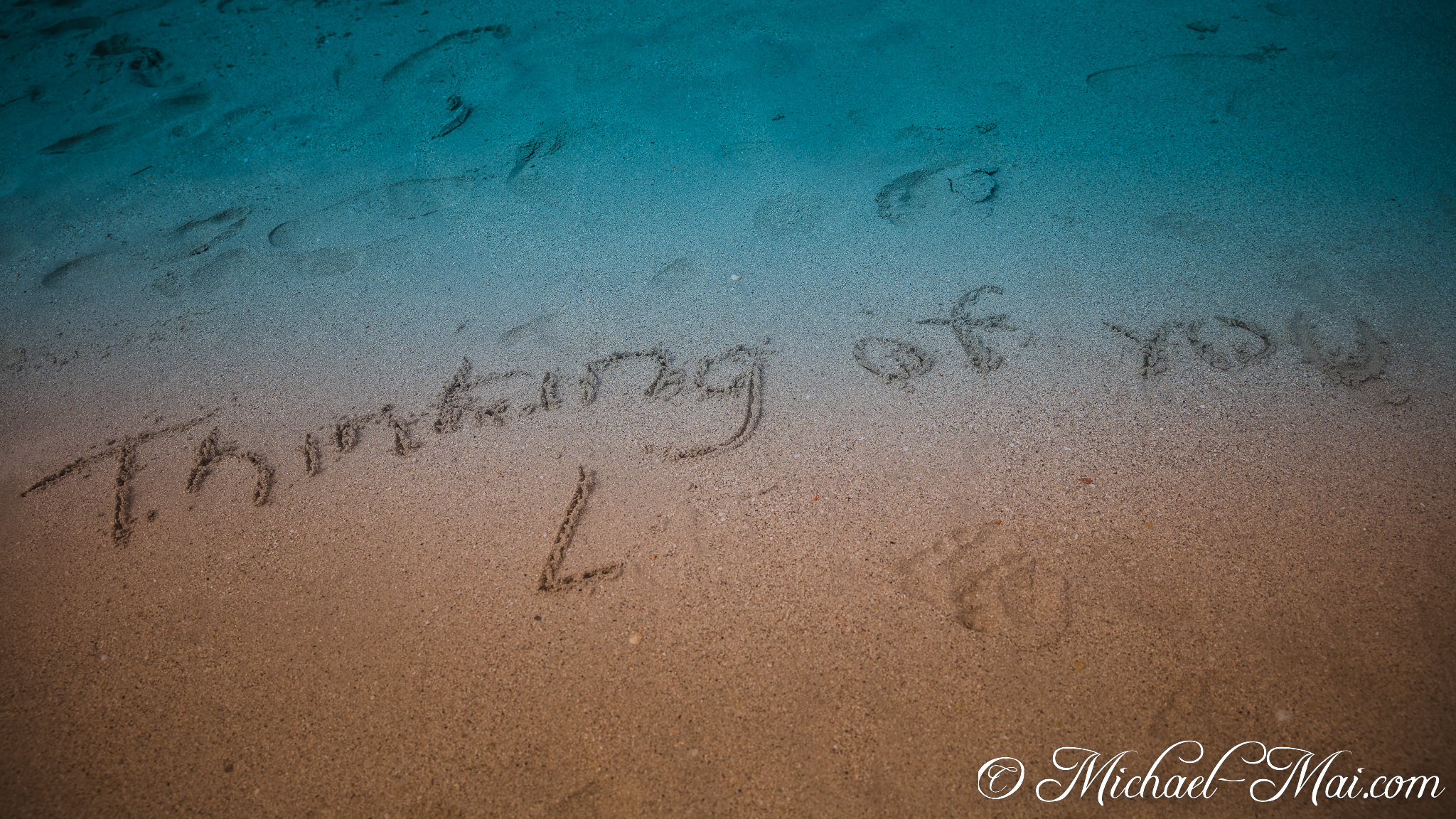 Sentimental words and an initial carefully traced into the soft, shifting sand. | Miami Beach, Florida, United States