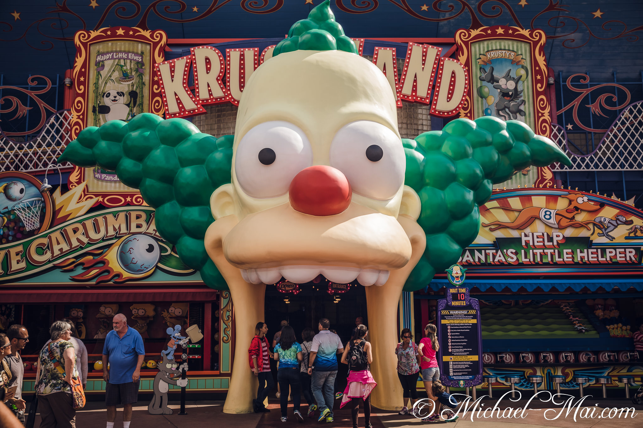 Krusty's massive clown face serves as a whimsical gateway to Krustyland. | Orlando, Florida, United States