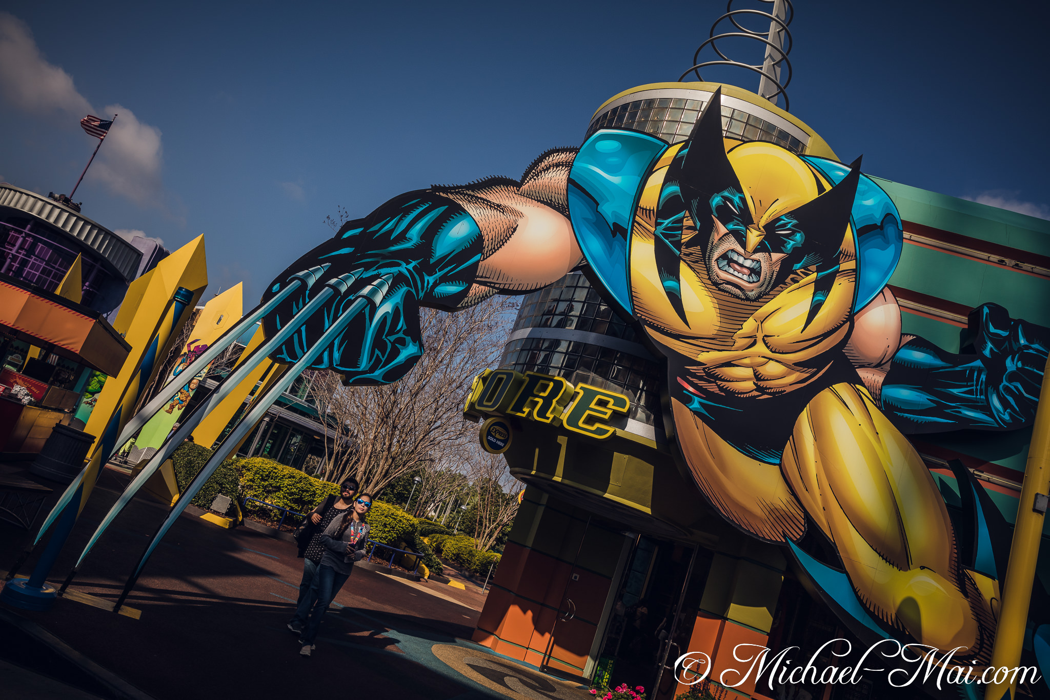 Wolverine lunges forward from a building, claws extended, in a striking comic art display. | Orlando, Florida, United States