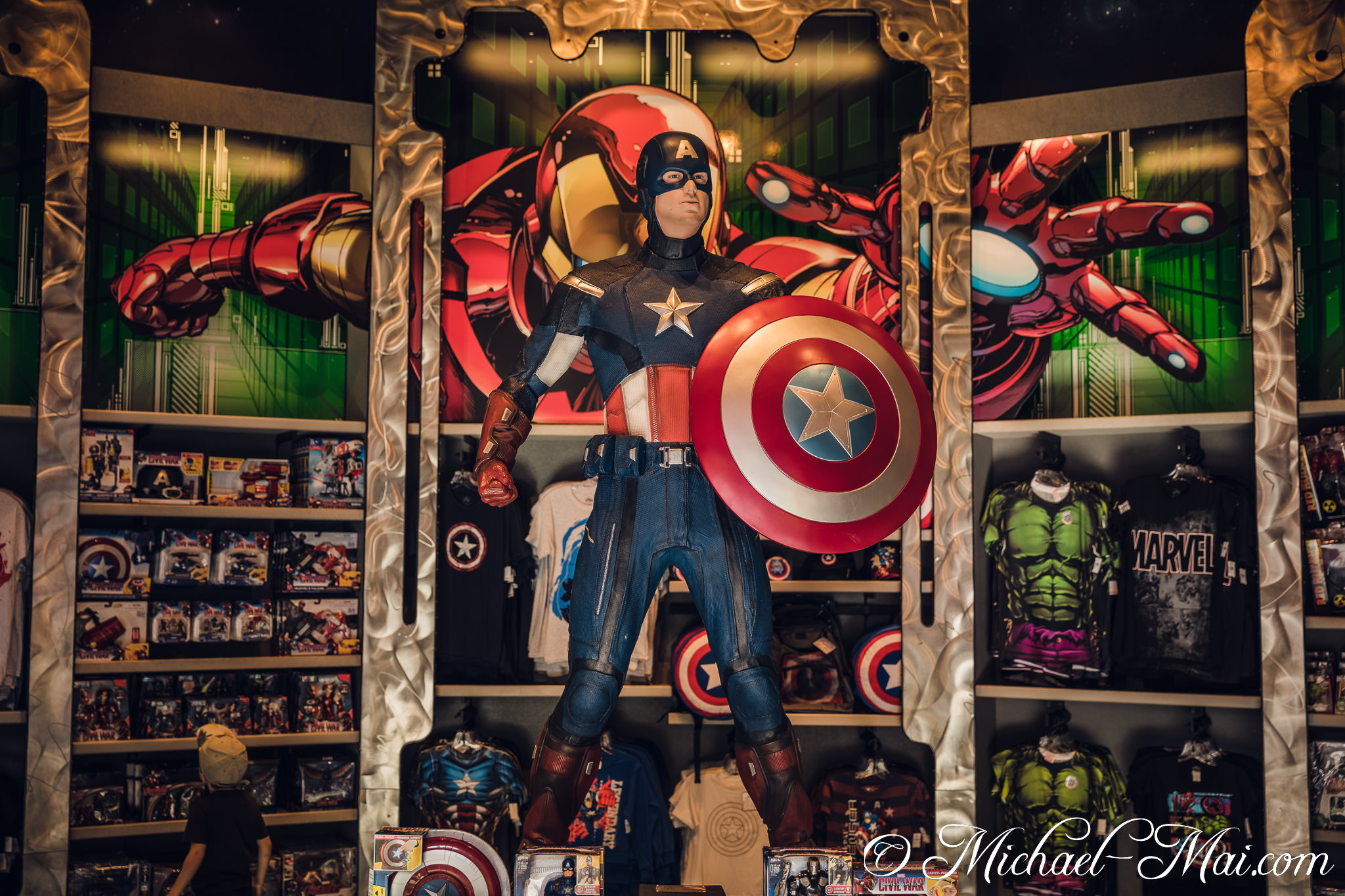 Encounter Captain America's heroic statue amidst a colorful display of Marvel merchandise. | Orlando, Florida, United States