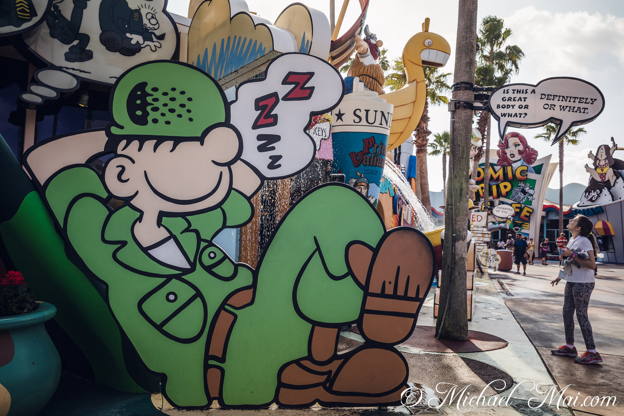 Oversized comic soldier dreams Zzzs near a quirky speech bubble and water fun. | Orlando, Florida, United States